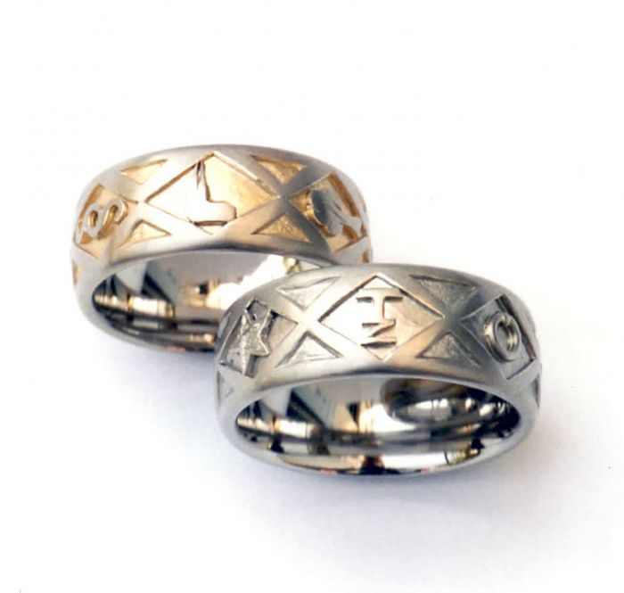 Symbol-Eheringe 750/- Gelb- und Weißgold